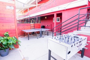 outdoor-game-area-with-foosball-and-ping-pong-at-california-dreams-hostel-ocean-beach
